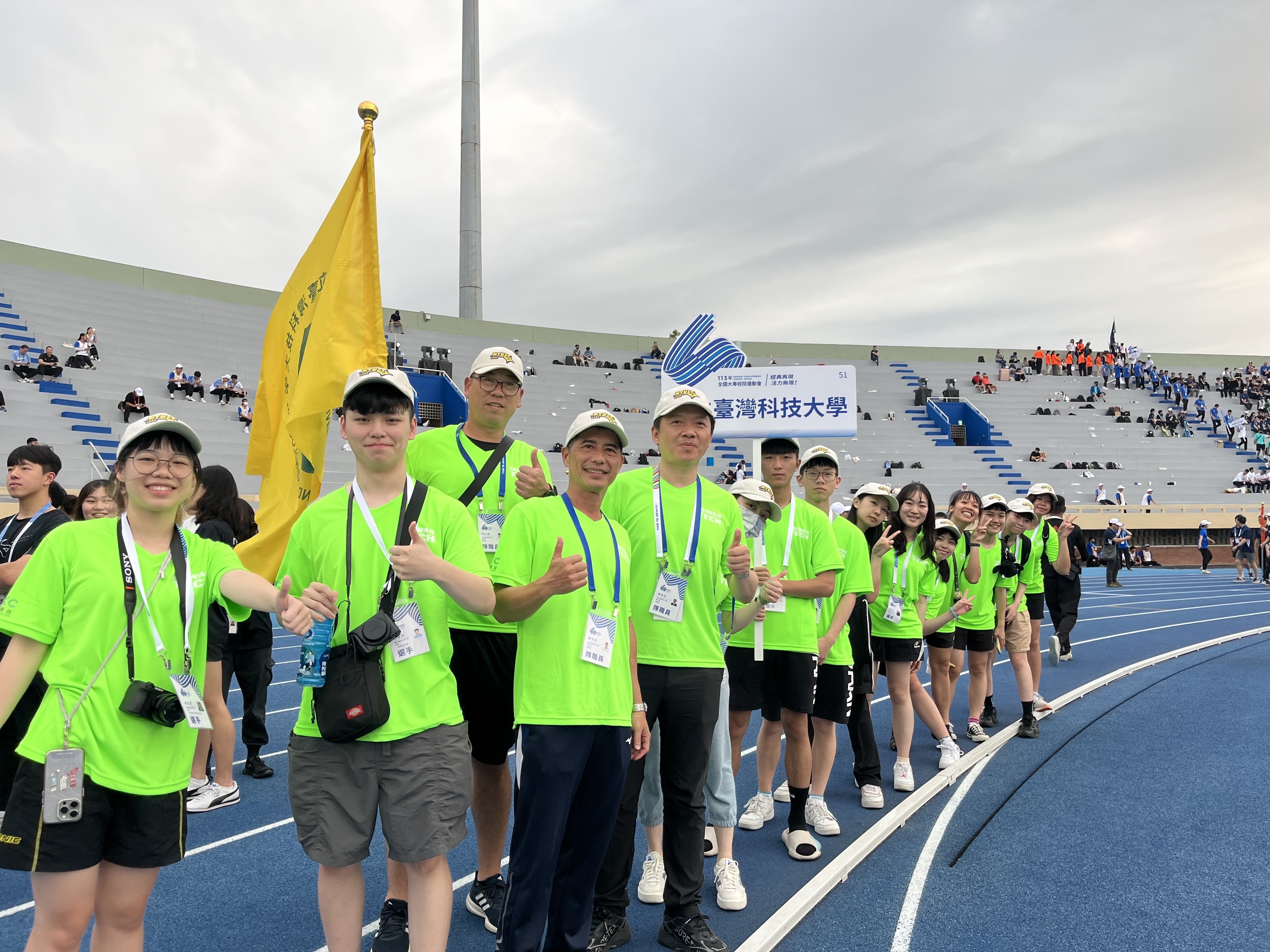 A group photo of the Taiwan Tech team at the opening ceremony of the National College Sports Games