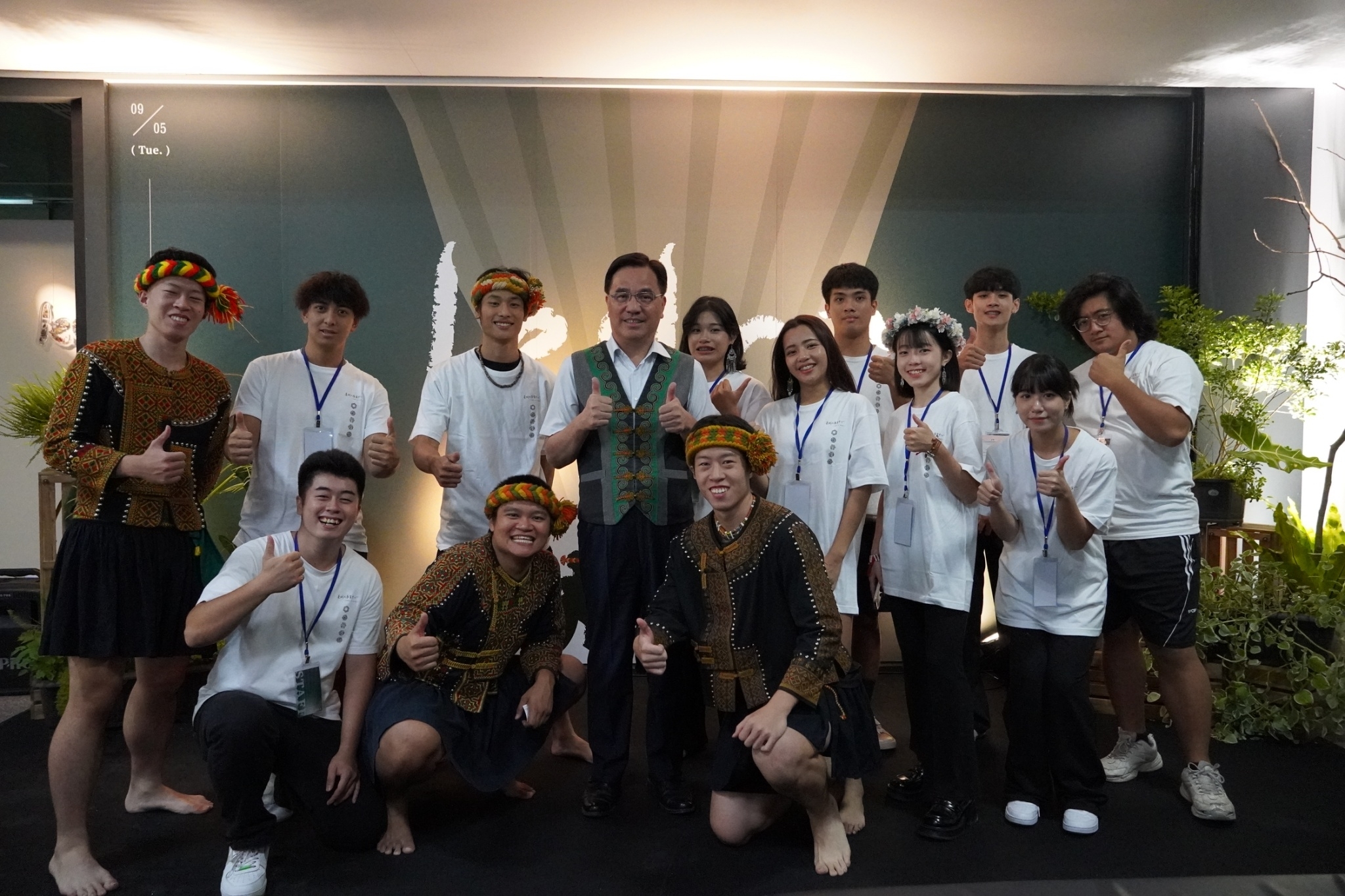 The chairman of the Indigenous Peoples Commission, Yi-Jiang Palarur (center), pictured with indigenous students from Taiwan Tech.