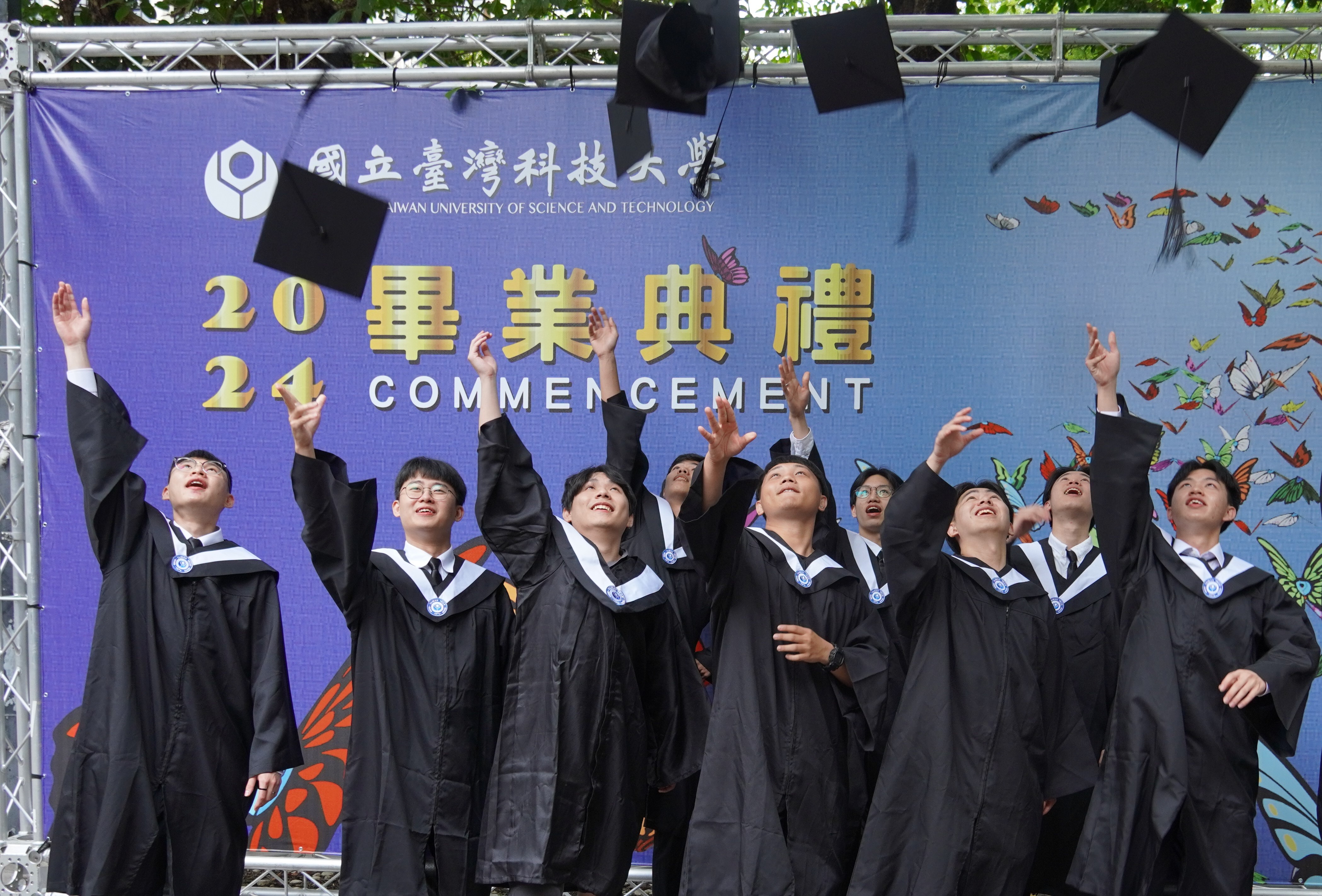 Taiwan Tech Students joyfully celebrate graduation.