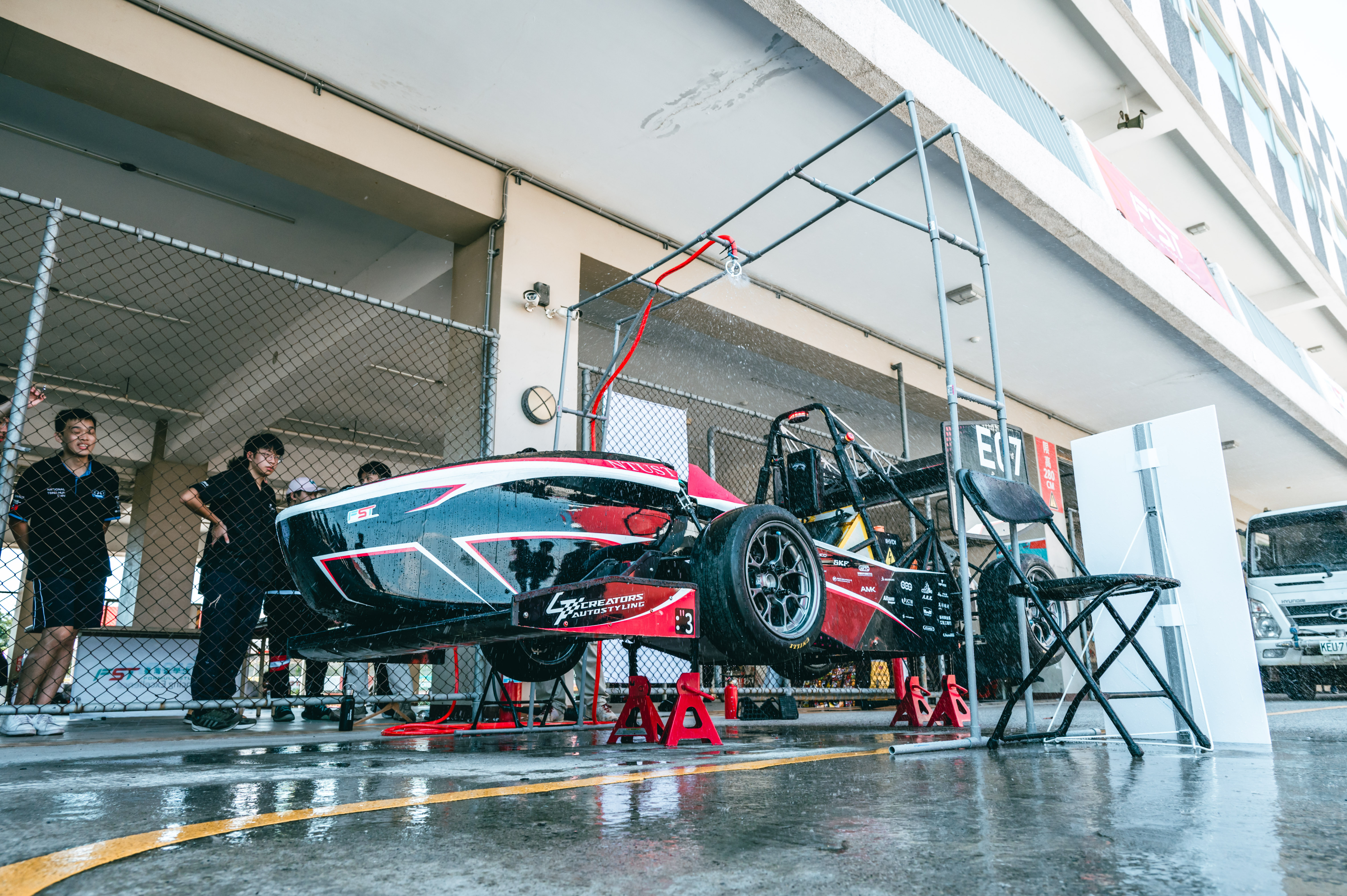 The vehicle undergoes a rain test.