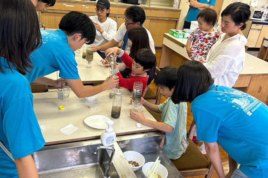 Engineers in Action team from Taiwan Tech conducted water filtration and handmade soap workshops in Kawakami Village, Japan, enabling local residents to filter spring water using simple devices.